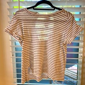 White and brown striped t-shirt.